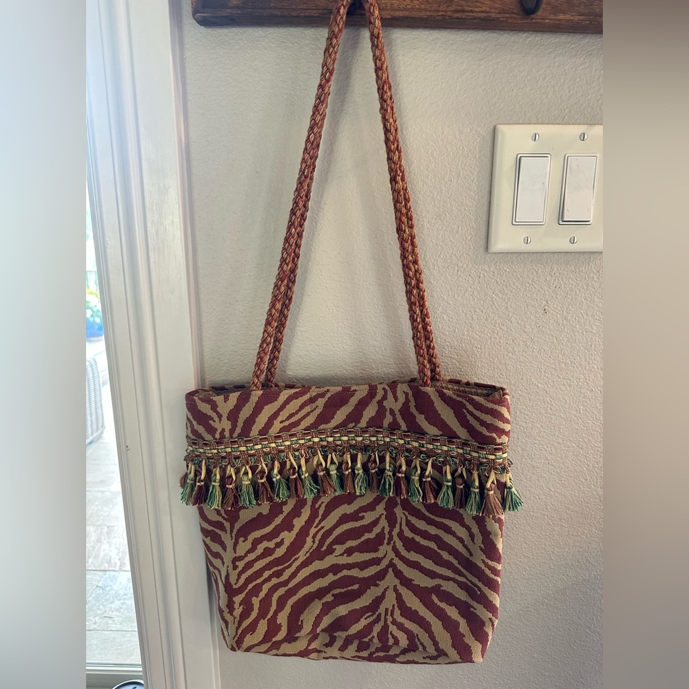 Stylish Maroon and Tan Zebra Tote Bag with Tassel Detail - Picture 9 of 10